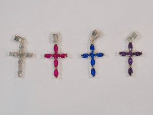 silver cross with precious stones