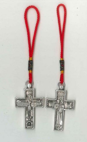 Two-faced metallic cross